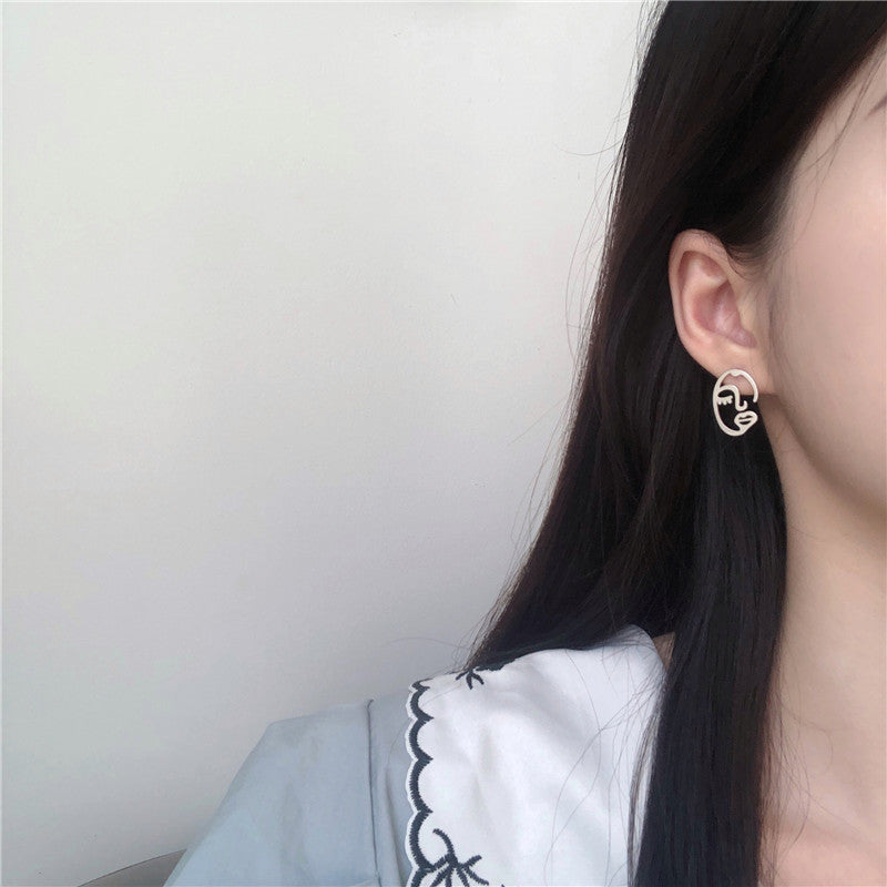 Hollow Portrait Earrings