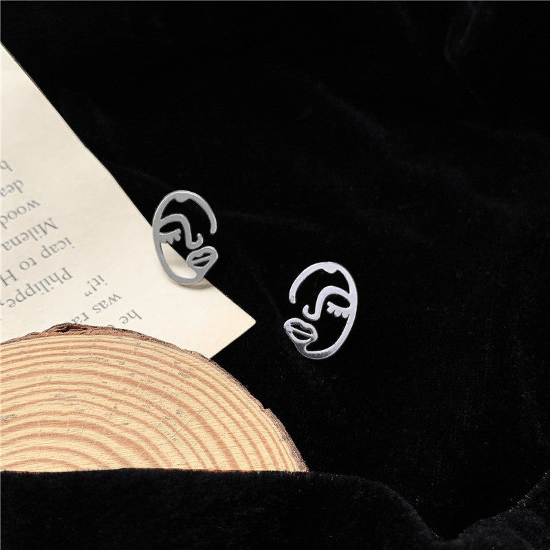Hollow Portrait Earrings
